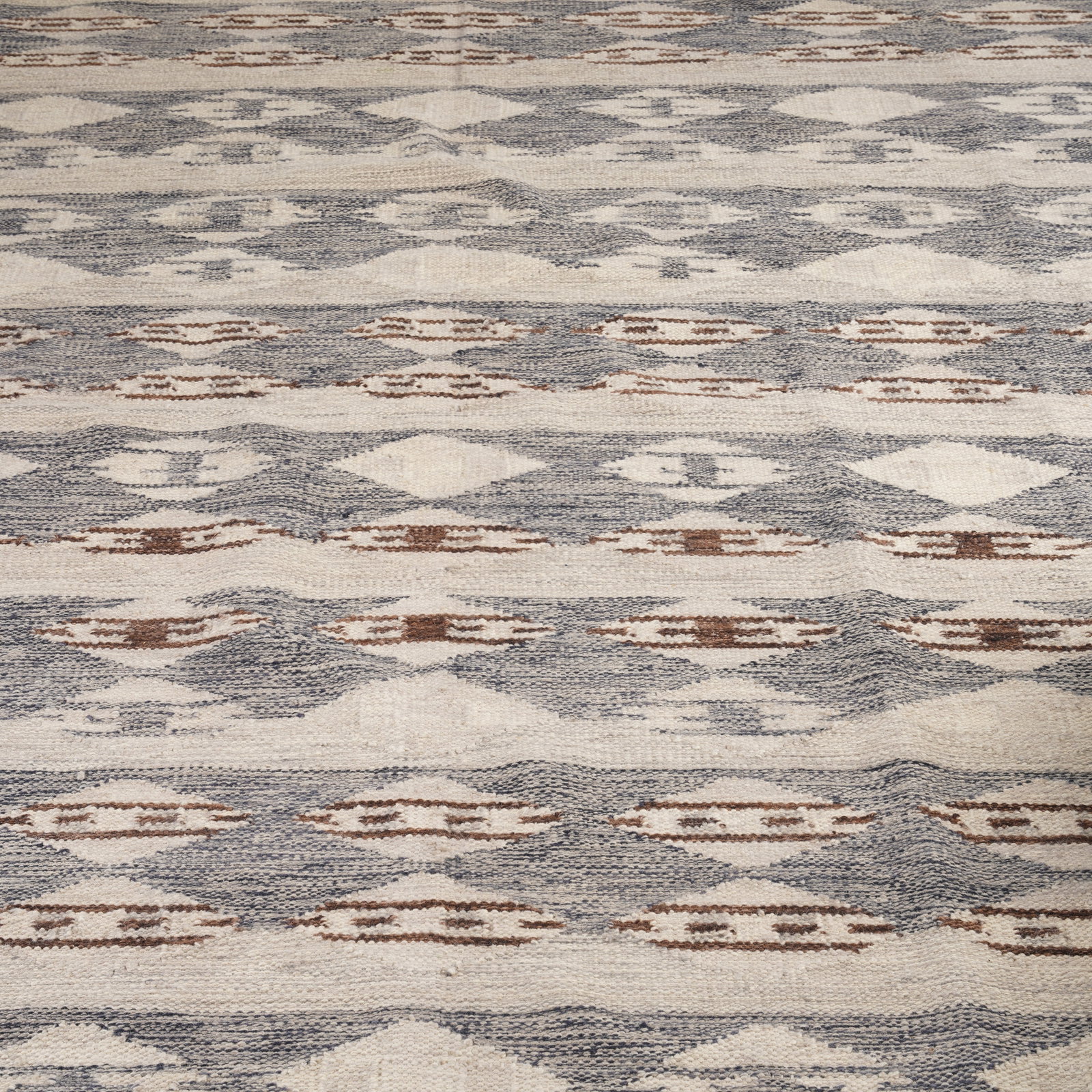 In the Manner of Marta M??s-Fjetterstrom (Swedish, 1873-1941) Flat-weave carpet (1 of 2)