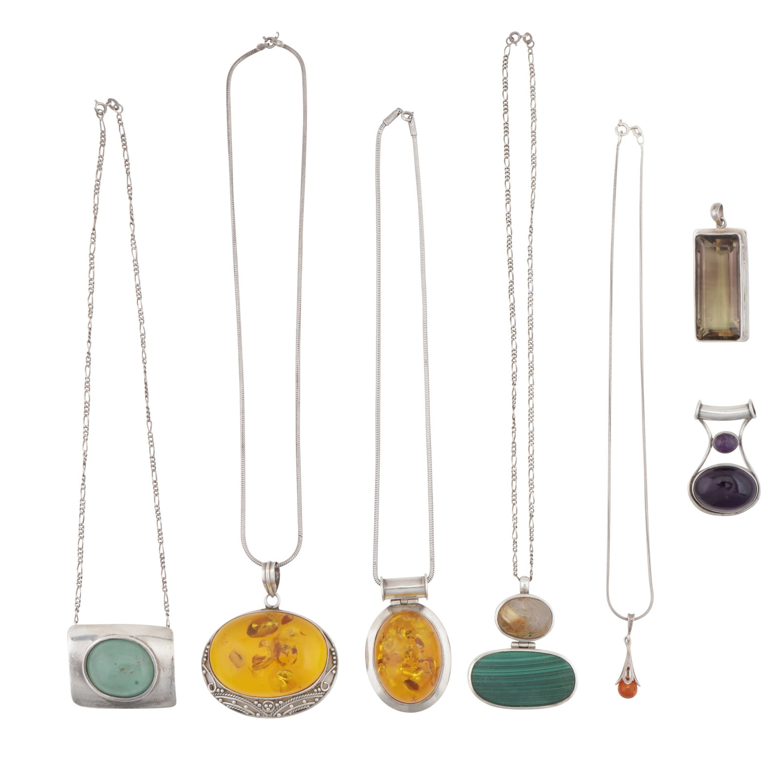 Five necklaces and two pendants: Five necklaces and two pendants Each set with a gemstone, including amber, malachite, amethyst, and smoky quartz, some stamped silver, others unmarked and untested, various sizes (7)