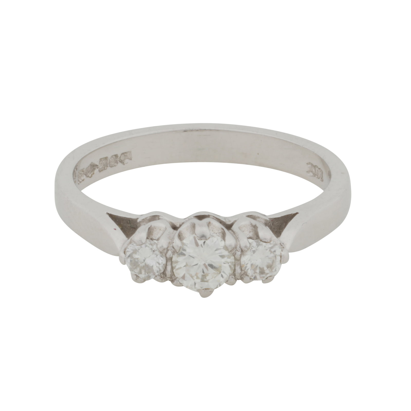 A diamond three stone ring, circa 1997 Platinum: A diamond three stone ring, circa 1997 Platinum Claw-set with graduated brilliant-cut diamonds, to pointed shoulders, diamonds approx. 0.25 carat total, maker's mark, UK hallmark, size M