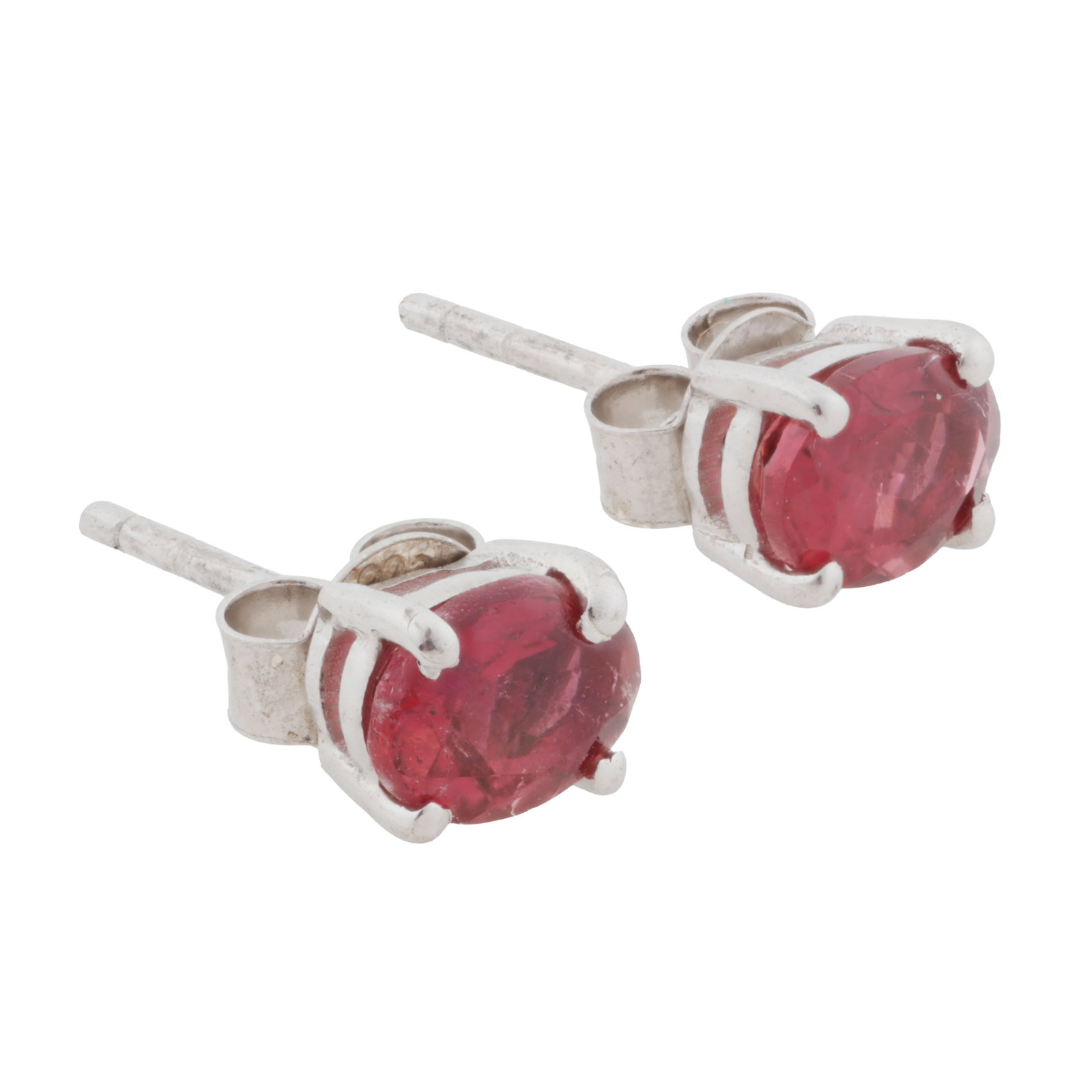A pair of pink tourmaline stud earrings White metal: A pair of pink tourmaline stud earrings White metal Claw-set with oval-cut pink tourmalines, set in white metal, butterflies stamped 925, post fittings, length 0.7cm