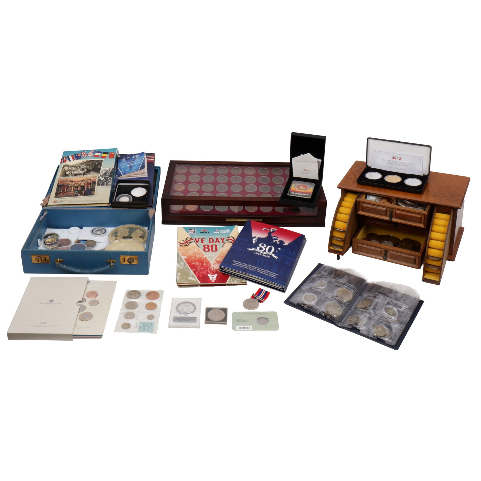 A substantial group of coins: A substantial group of coins The group to include Danbury Mint Britannia pennies set, a 2026 Royal Mint set, a Jubilee Mint Charles III gold plated and silver plated £5 set, and a substantial