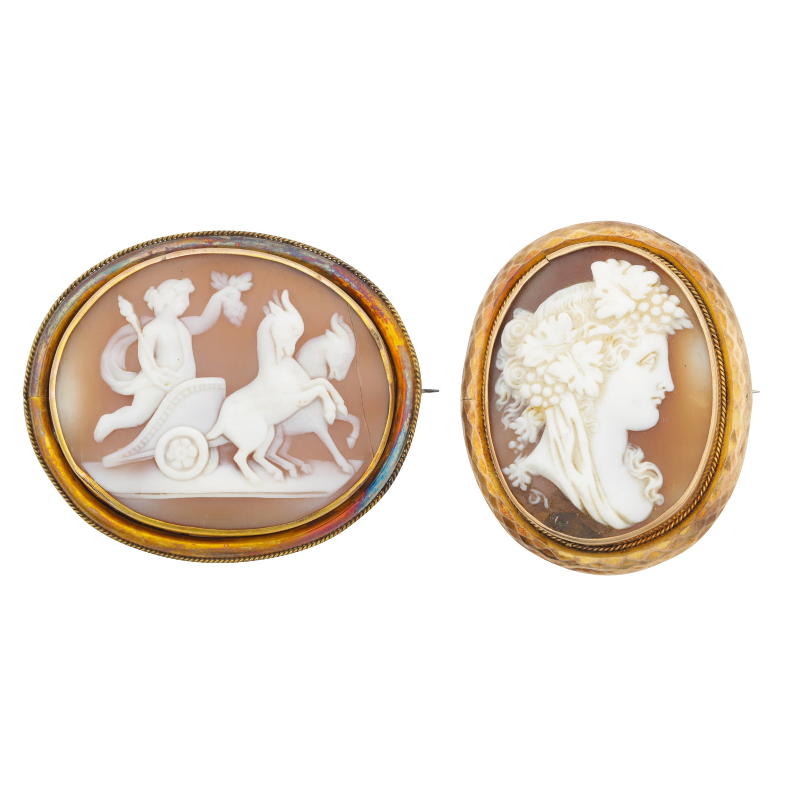 Two cameos Yellow metal: Two cameos Yellow metal Both of oval design, one featuring a lady's portrait looking right, to a rope-twist and faceted border, the other one featuring a chariot and horses, to a rope-twist border;
