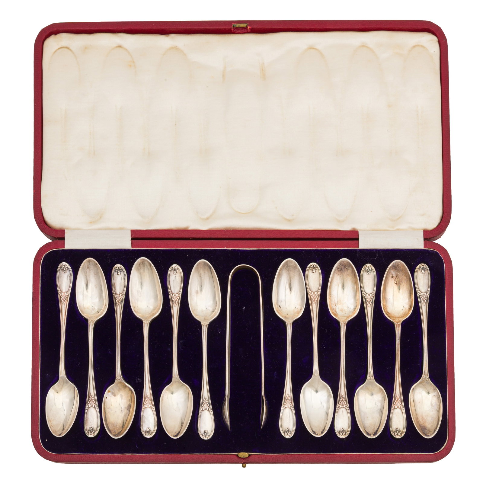Sheffield 1914 by James Dixon and Sons A cased set of twelve George V sterling silver teaspoons: Sheffield 1914 by James Dixon and Sons A cased set of twelve George V sterling silver teaspoons Together with a pair of sugar tongs, 1909. Length - 13 cm / 5.11 inches Weight - 329 grams / 10.57 ozt