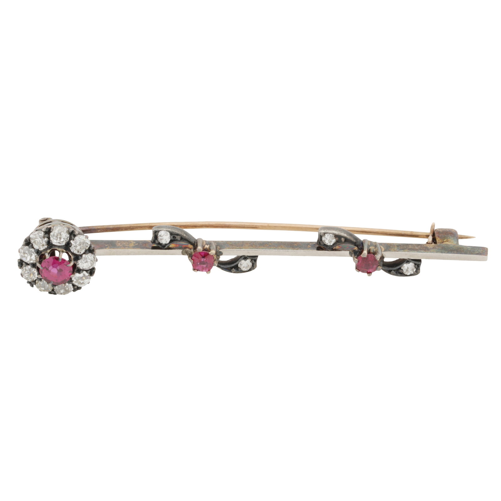 A Victorian ruby and diamond flower brooch Yellow and white metal: A Victorian ruby and diamond flower brooch Yellow and white metal The bar brooch set with circular-cut rubies and old-cut diamonds, pin and safety chain, unmarked and untested, length 6.0cm
