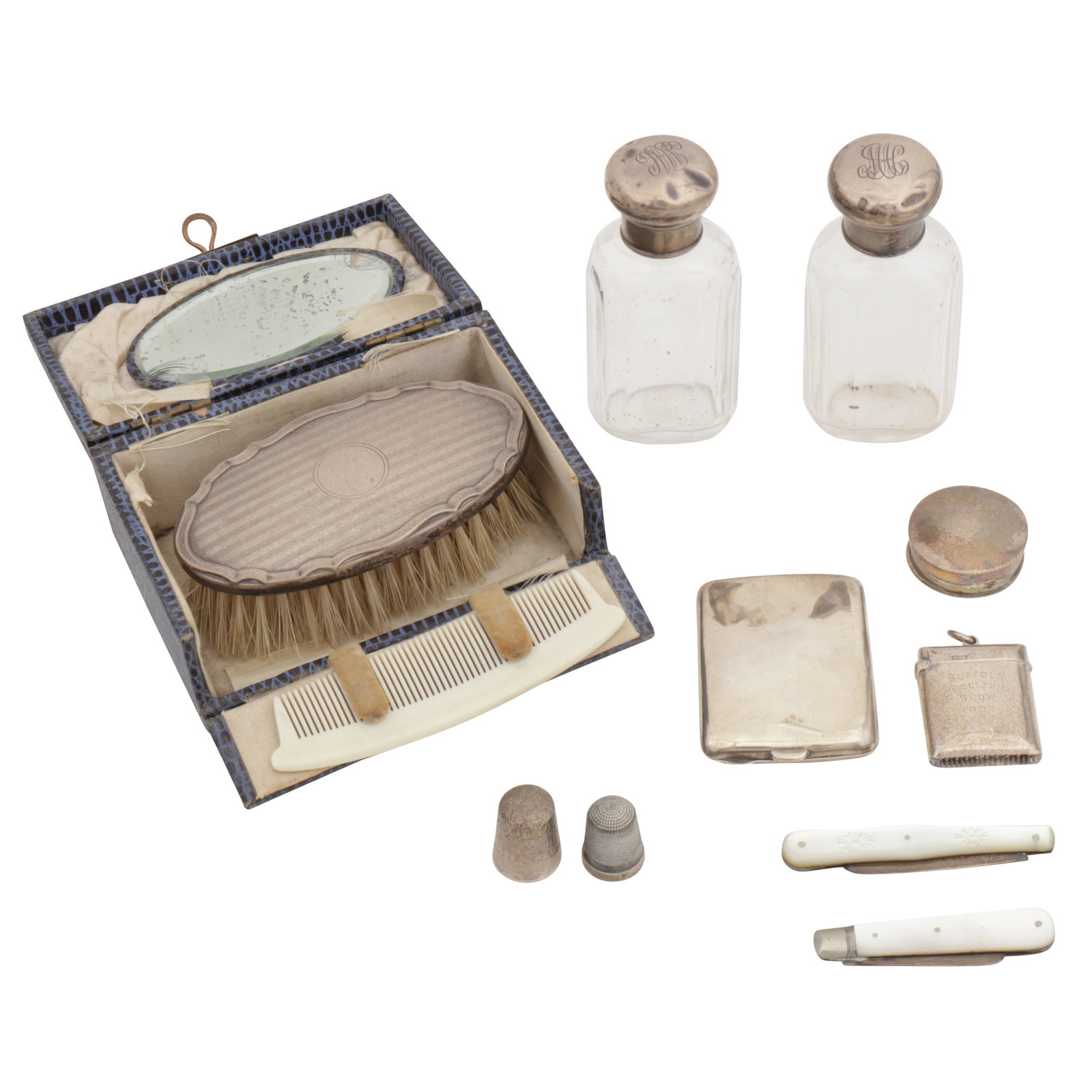 A mixed group of silver: A mixed group of silver Including a small cigarette case, Chester 1911 by WH Tandy and Sons, an Edwardian sterling silver vesta case with presentation inscription dated 1907, Chester 1906 by Rolason B