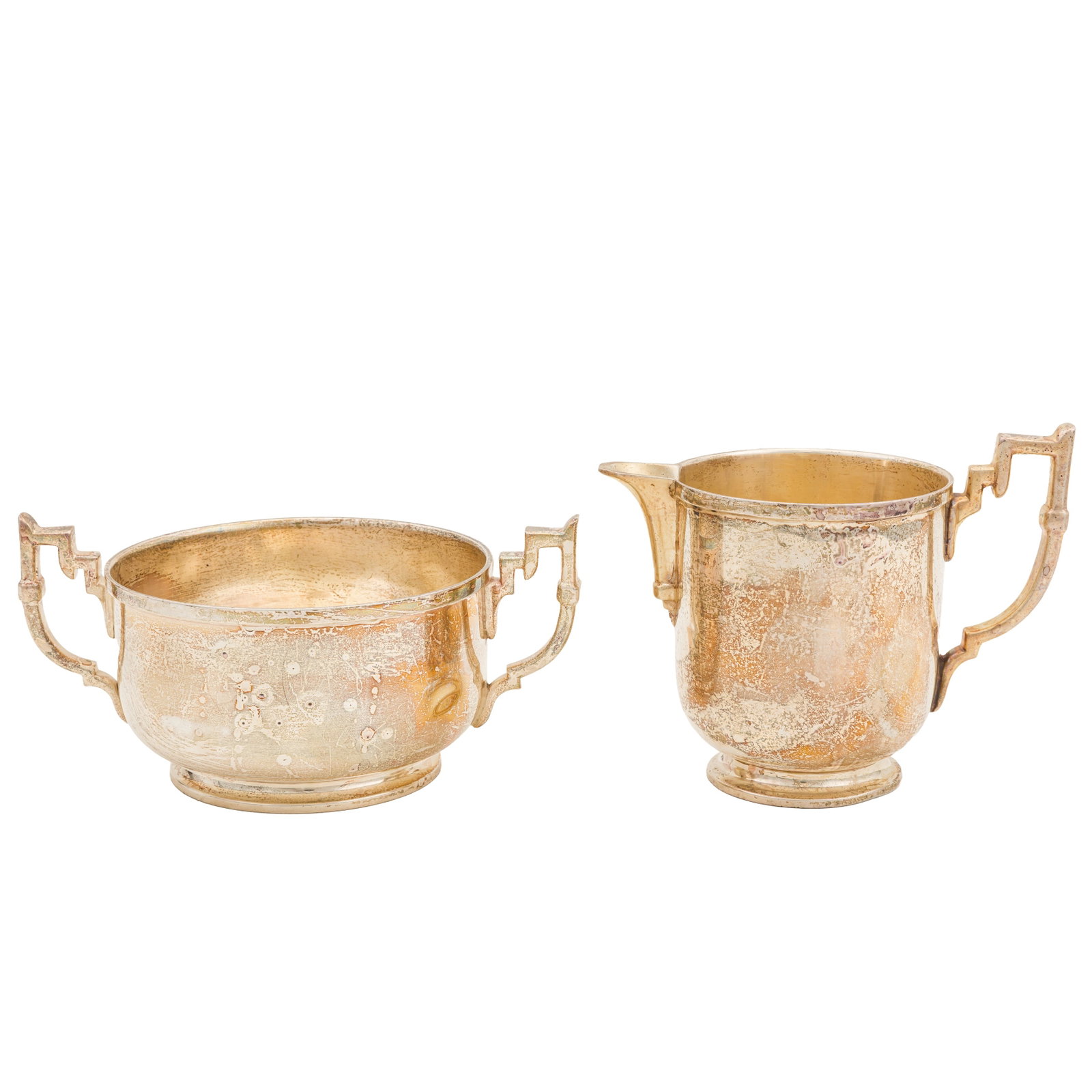 London 1946 by William Comyns A George Vi sterling silver strawberry set: London 1946 by William Comyns A George Vi sterling silver strawberry set Comprising twin handled sugar bowl and milk. With stepped c scroll handles. Sugar bowl length - 15.5 cm / 6.1 inches Weight -