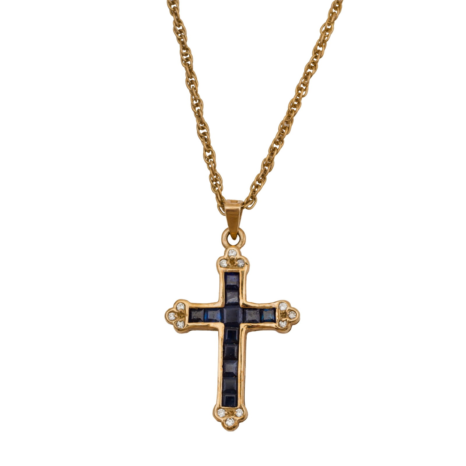 A sapphire and diamond cross pendant necklace 9ct yellow gold: A sapphire and diamond cross pendant necklace 9ct yellow gold The botonee cross channel-set with square-cut sapphires, accented by brilliant-cut diamonds, maker's mark, UK hallmark, chain stamped 9K,