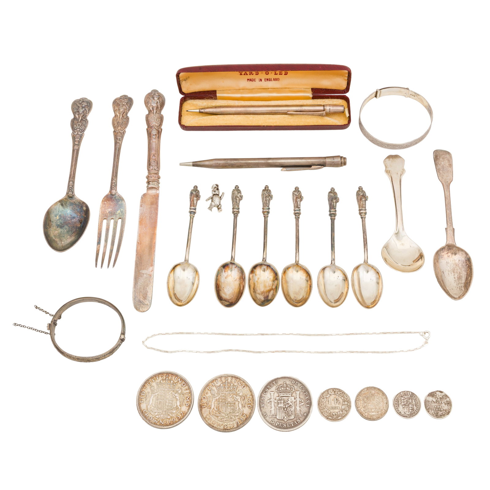 Sheffield 1881 by Henry Wilkinson and Co A cased Victorian sterling silver christening set: Sheffield 1881 by Henry Wilkinson and Co A cased Victorian sterling silver christening set Cherub terminal. Together with other sundry flatware, a cased yard-O-led pencil. Coins; George III 1816