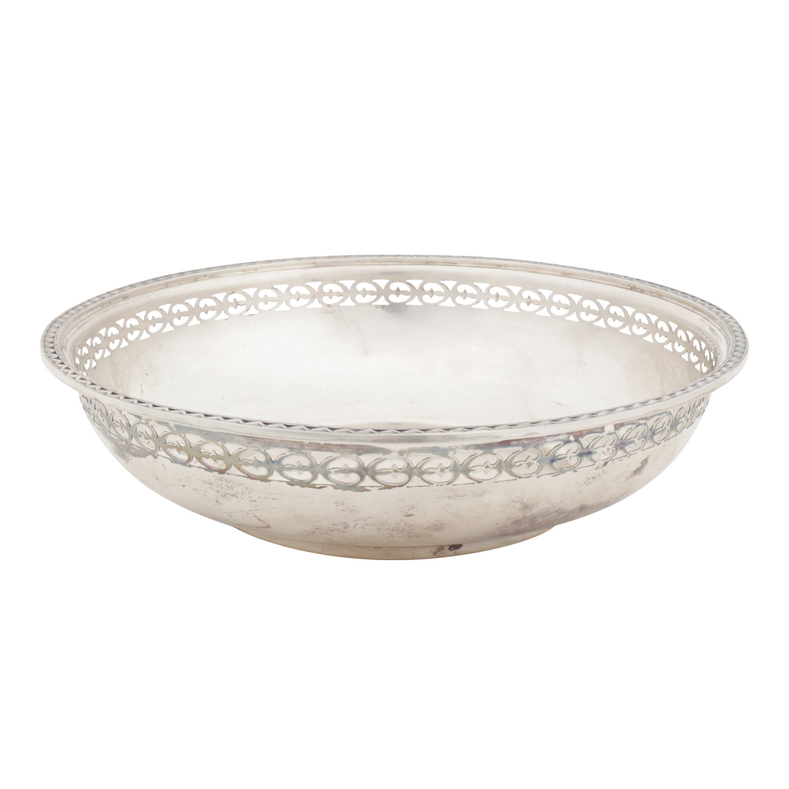 Sheffield 1958 by Walker and Hall An Elizabeth II sterling silver bowl: Sheffield 1958 by Walker and Hall An Elizabeth II sterling silver bowl Of round form, with pierced edge. Diameter - 20.3 cm / 8 inches Weight - 309 grams / 9.93 ozt