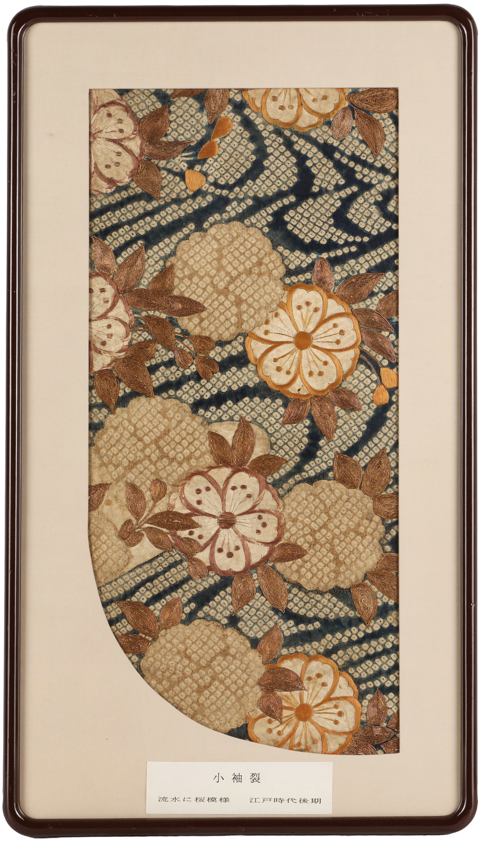 A Japanese framed 'flora' silk kimono sleeve, Edo period, 18th century (1 of 2)