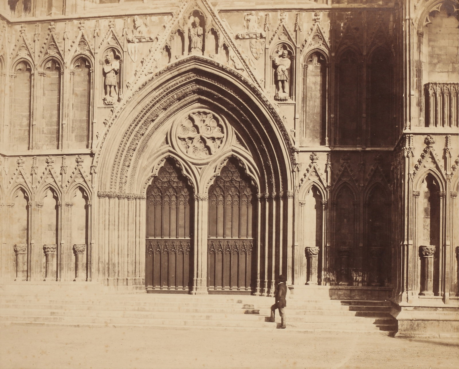 Roger Fenton (1819-1869) West Door, York Minster, c.1860: Albumen print from wet collodion glass negative, image size 35 x 44cm, pasted onto original paper support measuring 54 x 73cm. Qty: (1)