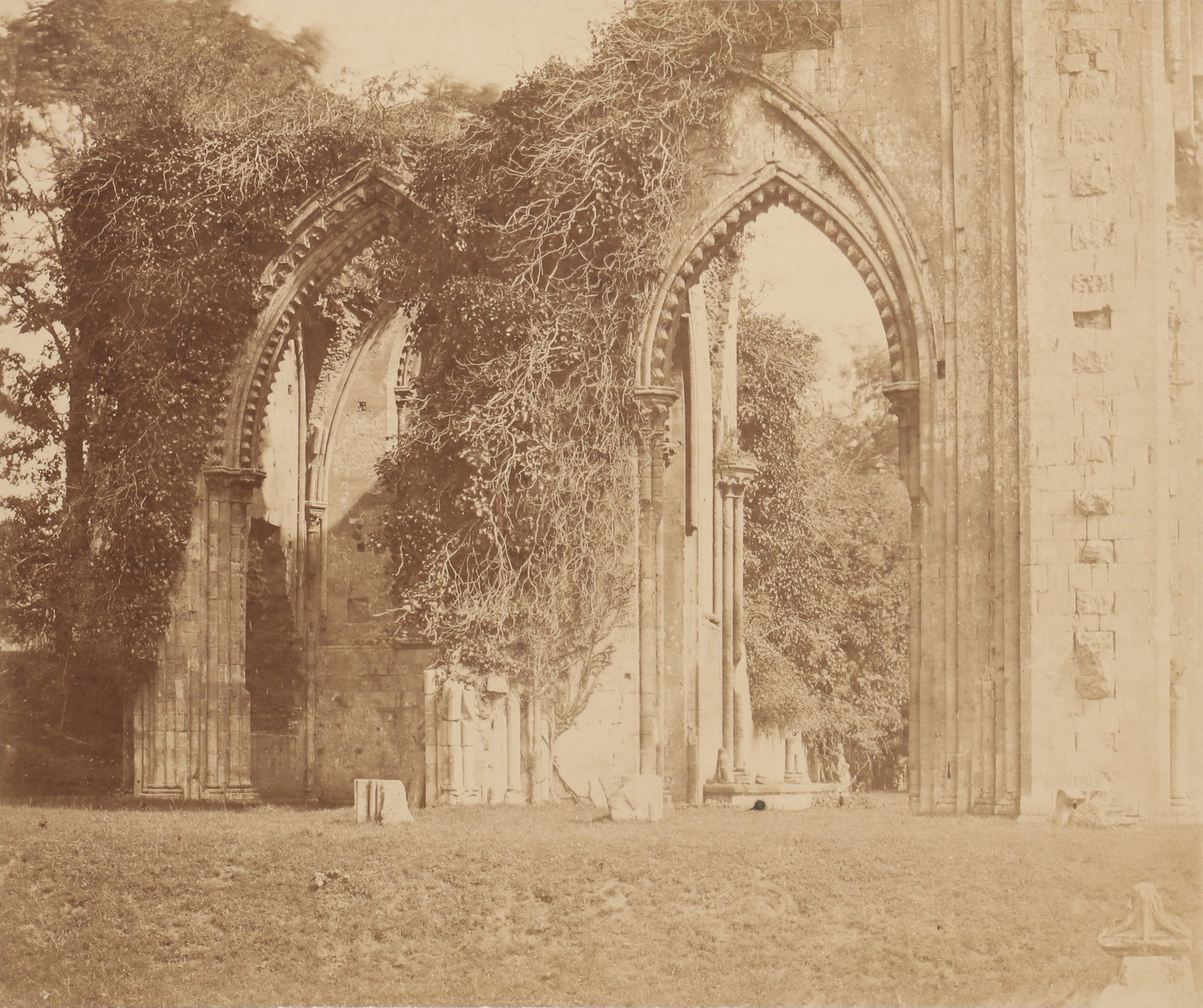 Roger Fenton (1819-1869) North Aisle Arches, Glastonbury Abbey, 1858: Albumen print from wet collodion glass negative, image size 36 x 43cm, pasted onto original paper support measuring 45 x 55cm, titled 'Glastonbury' in an unknown hand in pencil, with Fenton's printed 