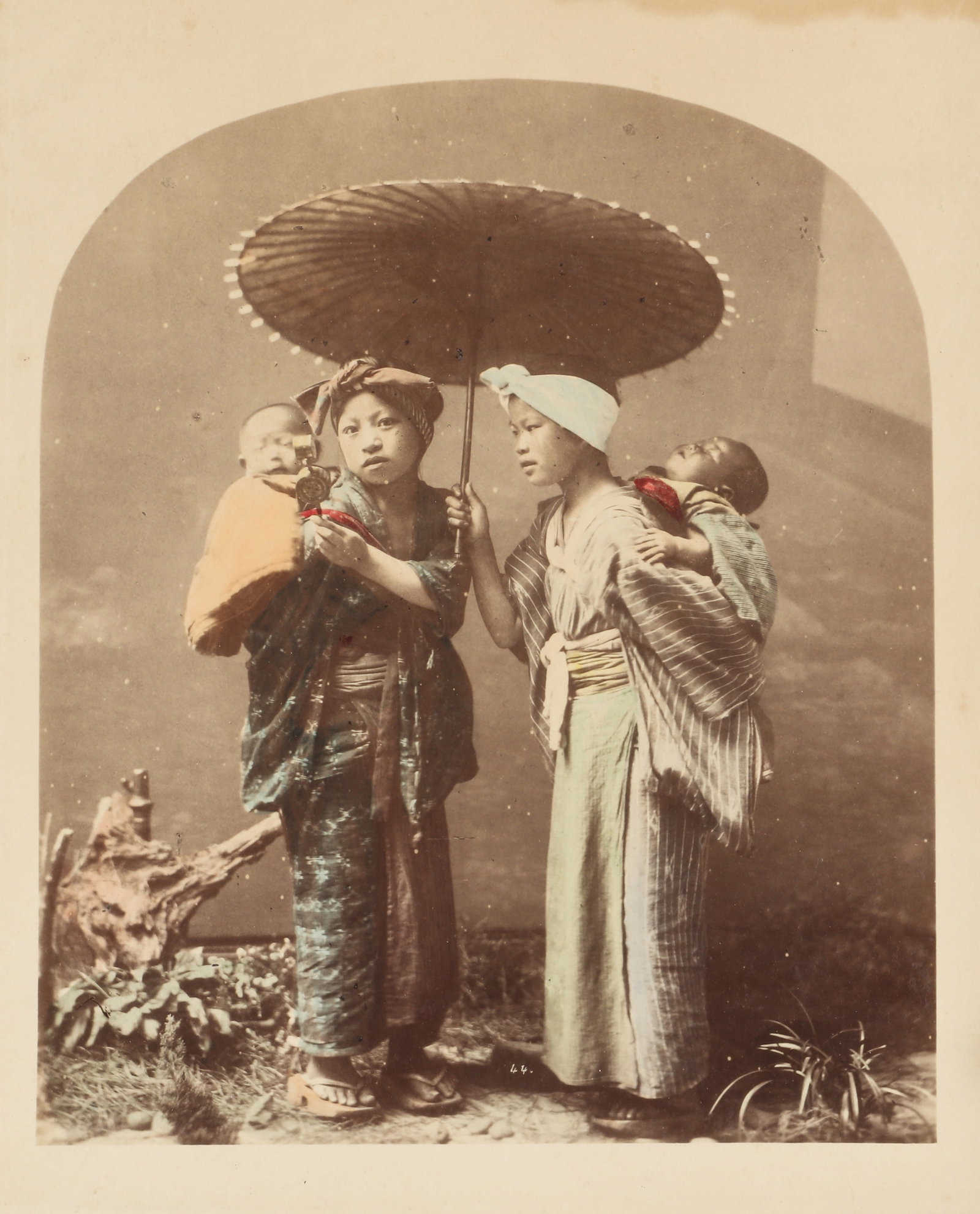 Studio of Kusakabe Kimbei, attr. (1841-1934) Komori, c.1880s: Hand-coloured albumen print mounted to card, image size 21 x 17.5cm, card size 30.5 x 24cm. *This lot is offered without reserve.