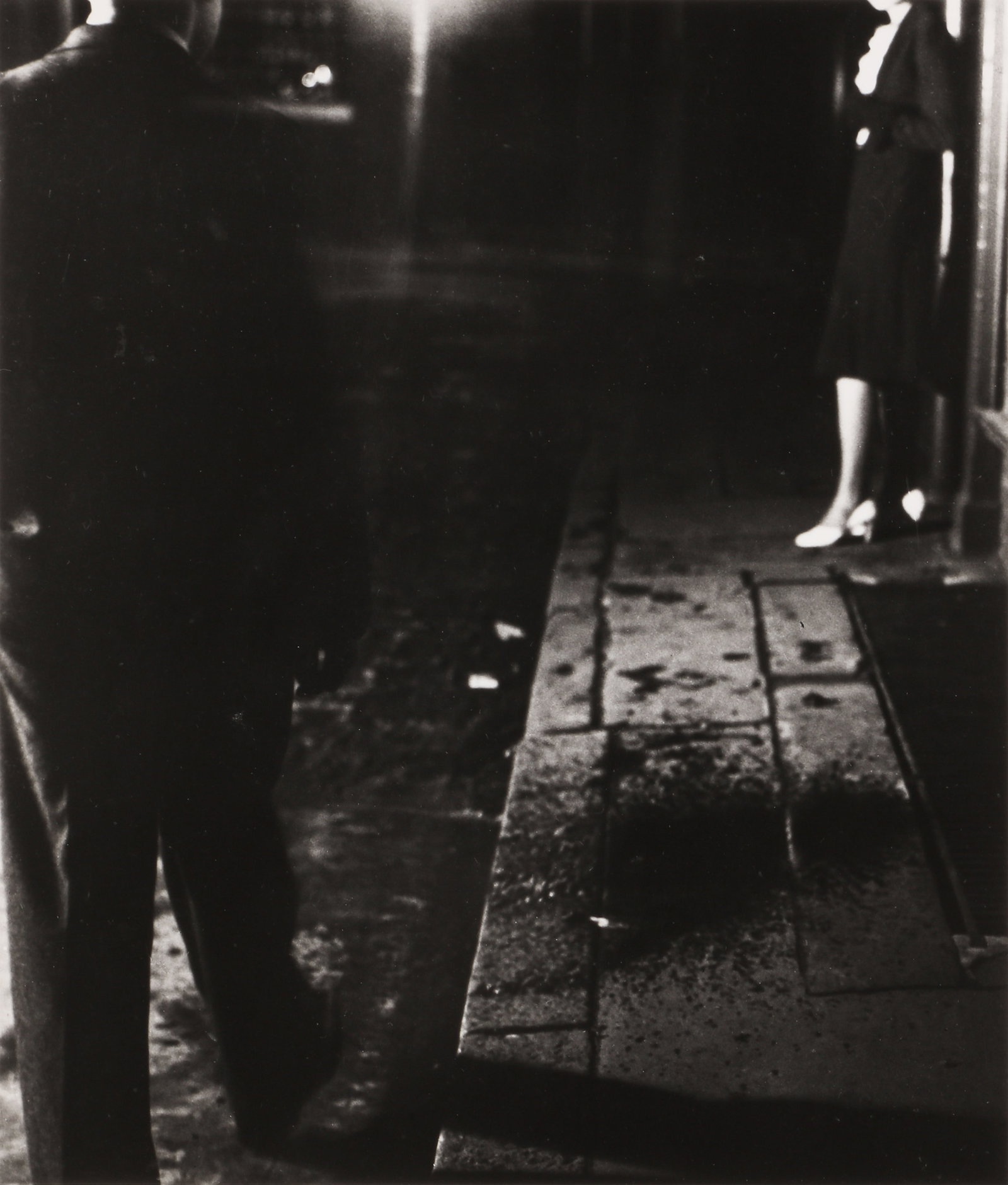 Bill Brandt (1904-1983) Footsteps Coming Nearer c. 1933-36: Silver gelatin print, flush-mounted to board, printed later, image size 34 x 29cm, board size 51 x 40.6cm, signed by the photographer in felt-tip pen lower margin recto, titled in an unknown hand in p