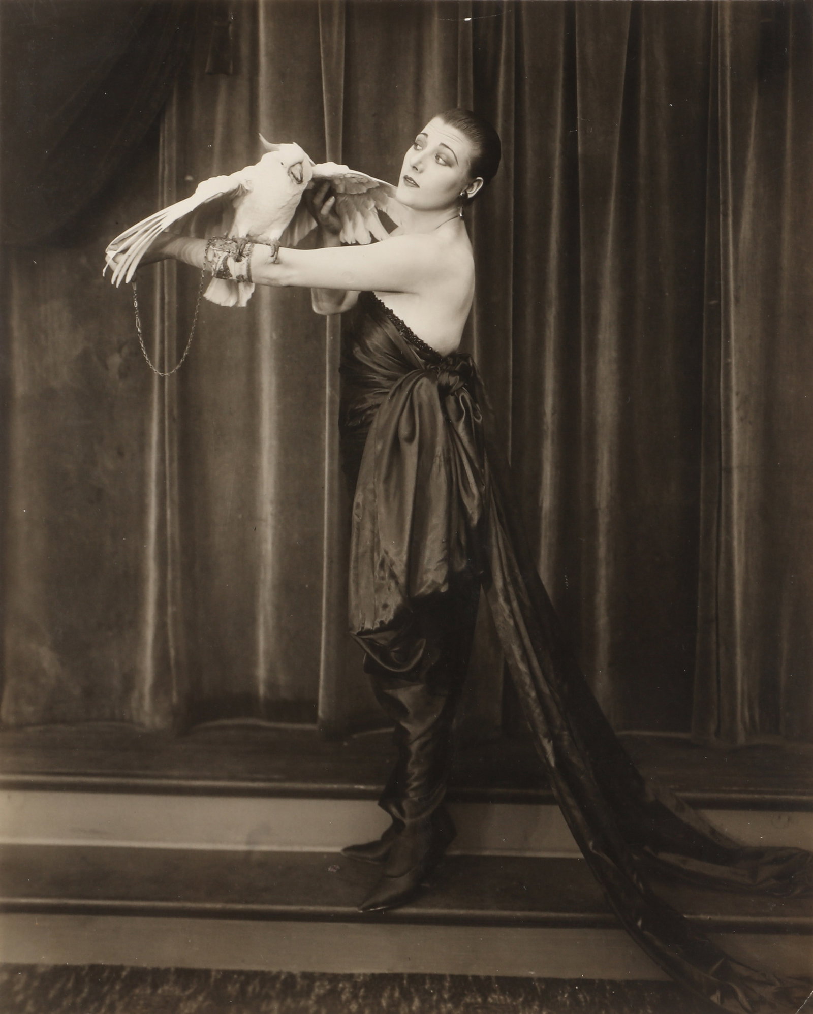 Culver Pictures Agency (c.1930s) Gloria Swanson with Bird, mid-20th century: Silver gelatin press print, image size 24 x 19.3cm, sheet size 25.3 x 20.5cm, with Culver Pictures credit stamp verso. *This lot is offered without reserve.