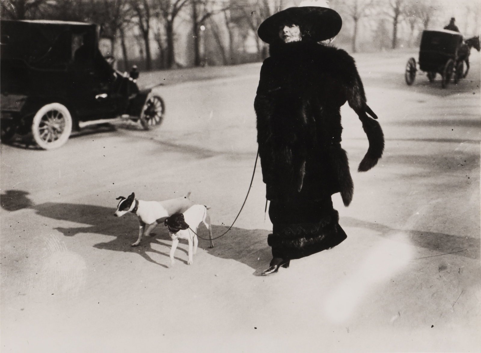 Jacques-Henri Lartigue (1894-1986) Avenue du Bois de Boulogne, 1911: Silver gelatin print, printed 1970s, image size18.5 x 25.2cm, sheet size 20.5 x 25.2cm, titled and annotated in an unknown hand verso, with The Photographers' Gallery, London, stamp verso. Lartigue be