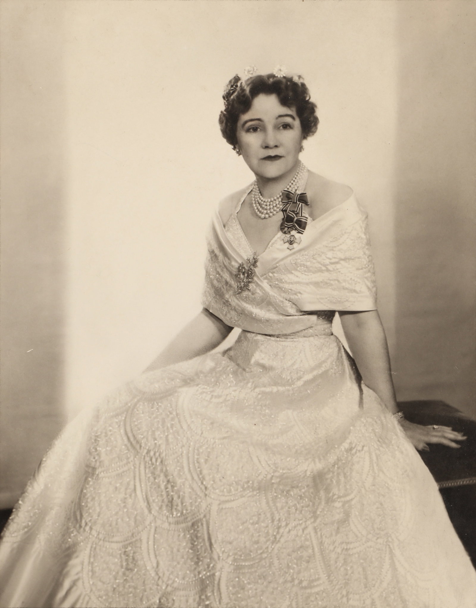 Dorothy Wilding (1893-1976) A Group of Studio Portraits, Women and Children, c.1930s: A group of five vintage silver bromide prints on Wilding's combination tissue and card mounts, images measuring 17 x 15.3cm (smallest) to 29 x 22.5 (largest), each signed by the photographer in pencil