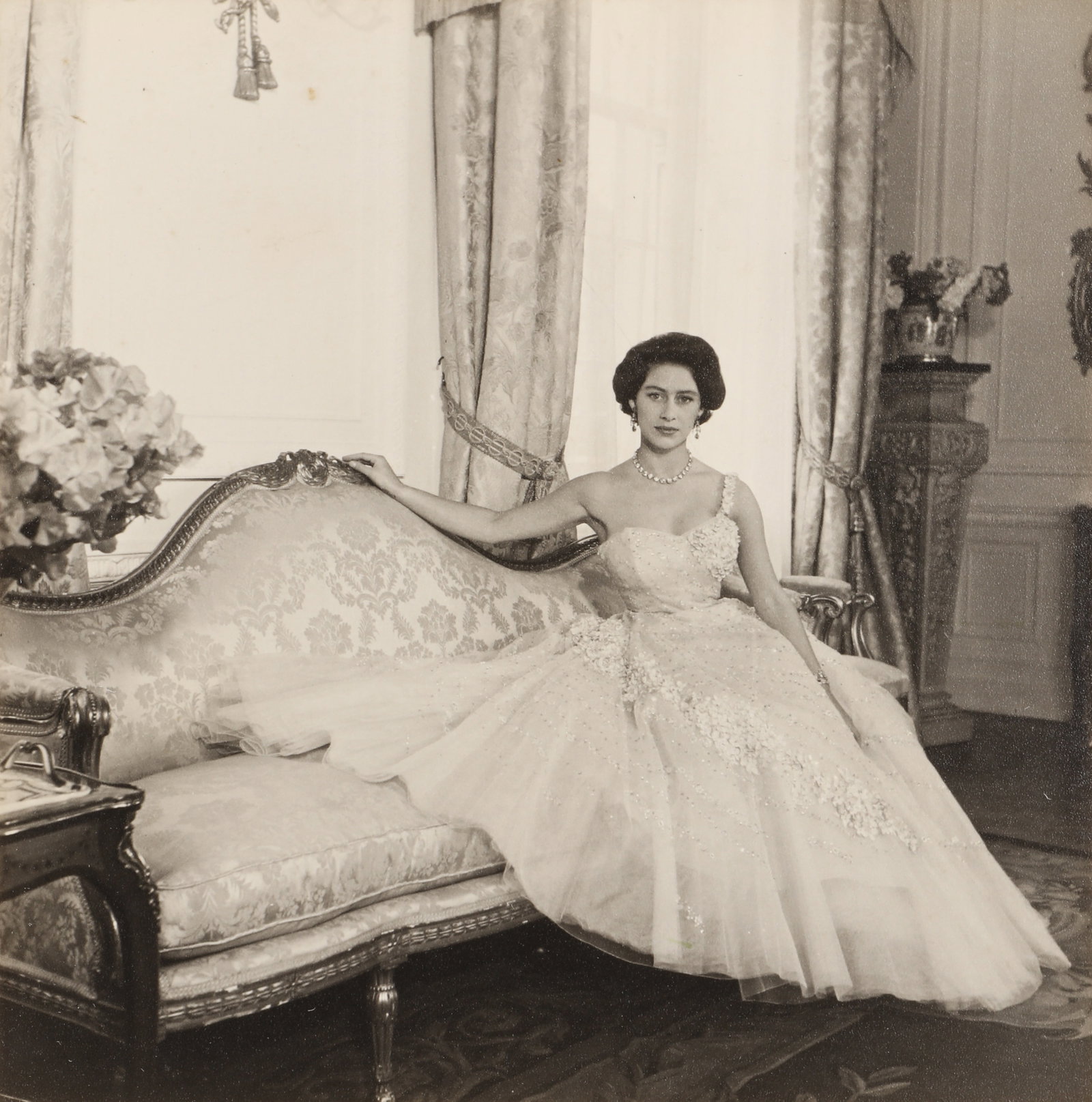 Cecil Beaton (1904-1980) Princess Margaret, Clarence House, 1956: Vintage silver print mounted to period card, image size 20 x 19.5cm, card size 29.3 x 27cm, signed by the photographer in pencil lower margin recto, with Beaton's credit stamp verso. A rare vintage va