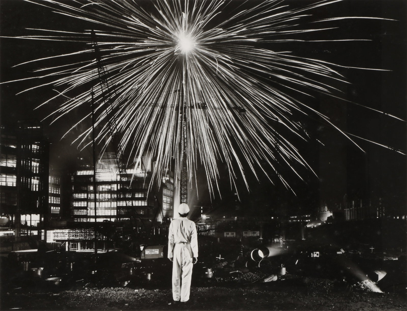 Brian Griffin (1948-2024) Big Bang, Broadgate, London, 1986: Vintage silver gelatin print, flush-mounted to board, image size 40.7 x53.5cm, board size 58.5 x74cm, signed and dated by the photographer in black ink lower right margin recto. Framed, frame size 61 