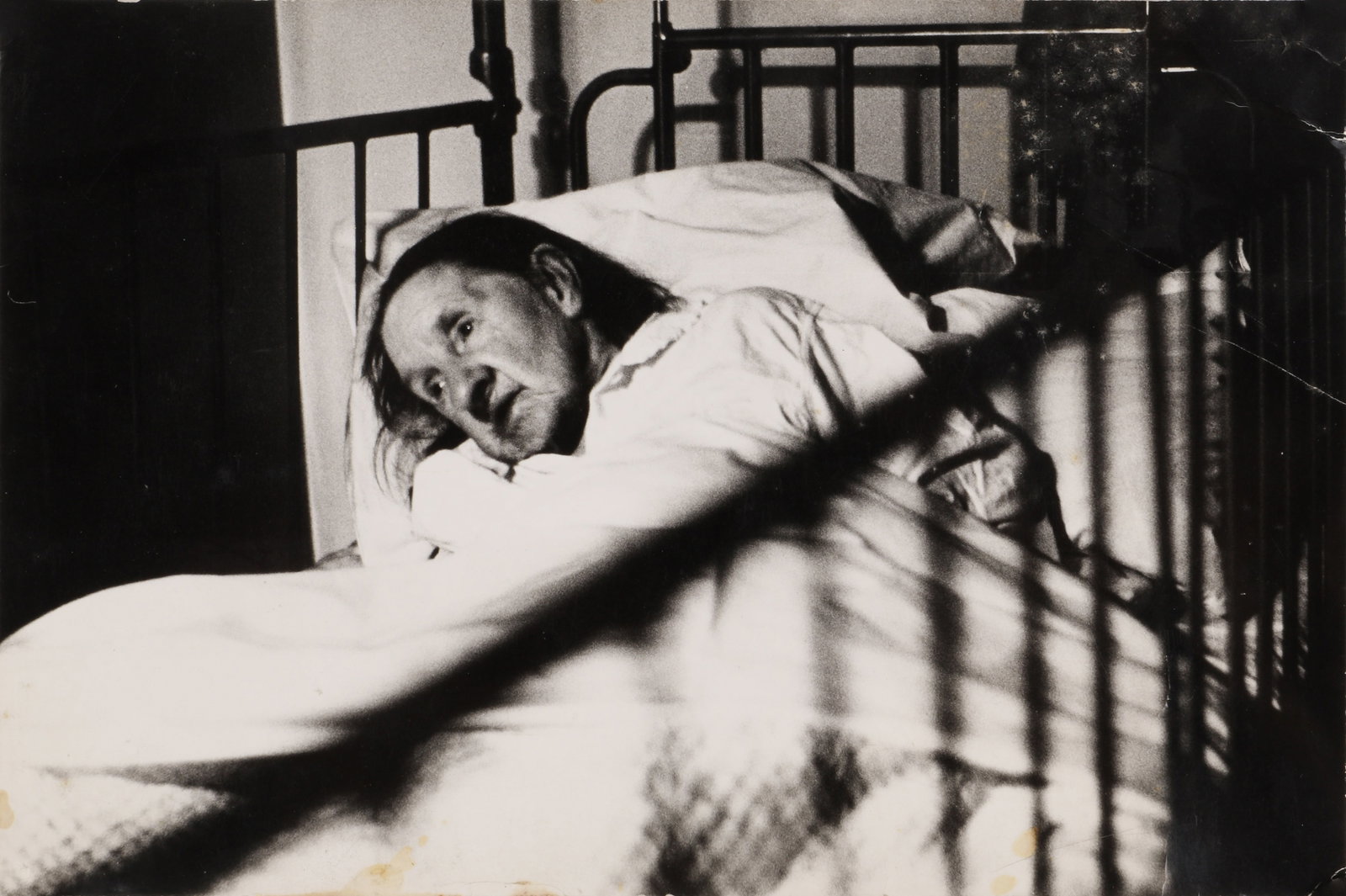 Roger Mayne (1929-2014) Untitled [Elderly Woman], c.1967: Vintage silver gelatin print, image/sheet size 17.5 x 26.5cm, annotated by the photographer in ink verso, with Mayne's Richmond address credit stamp verso. *This lot is offered without reserve. Proven