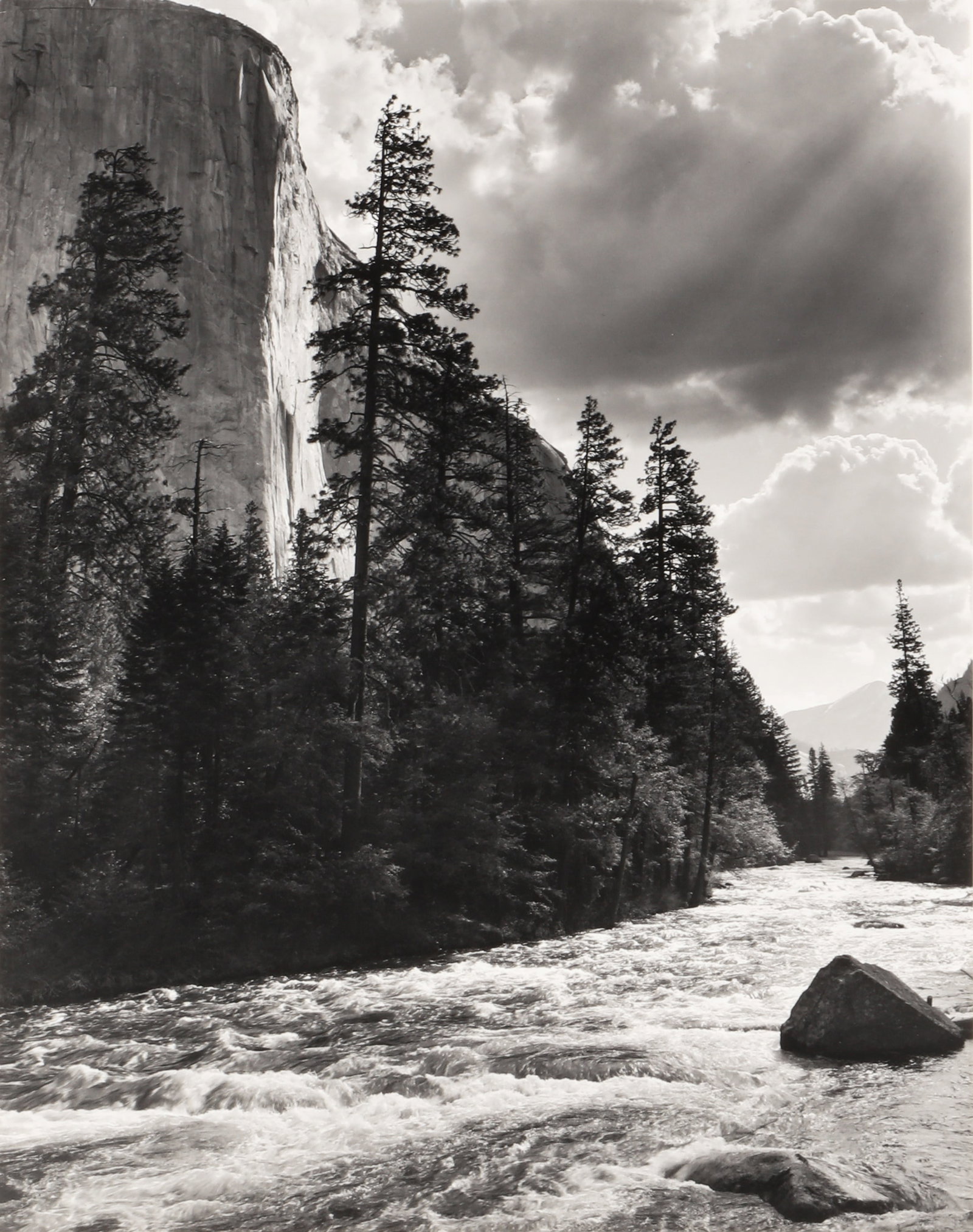 Ansel Adams (1902-1984) El Capitan, Merced River, Clouds, Yosemite National Park, California,: Silver gelatin print, printed c.2000 by Alan Ross, flush-mounted to board, image size 24 x 19cm, board size 43.5 x 35.5cm, with Special Edition Photographs of Yosemite stamp verso, initialed in ink by
