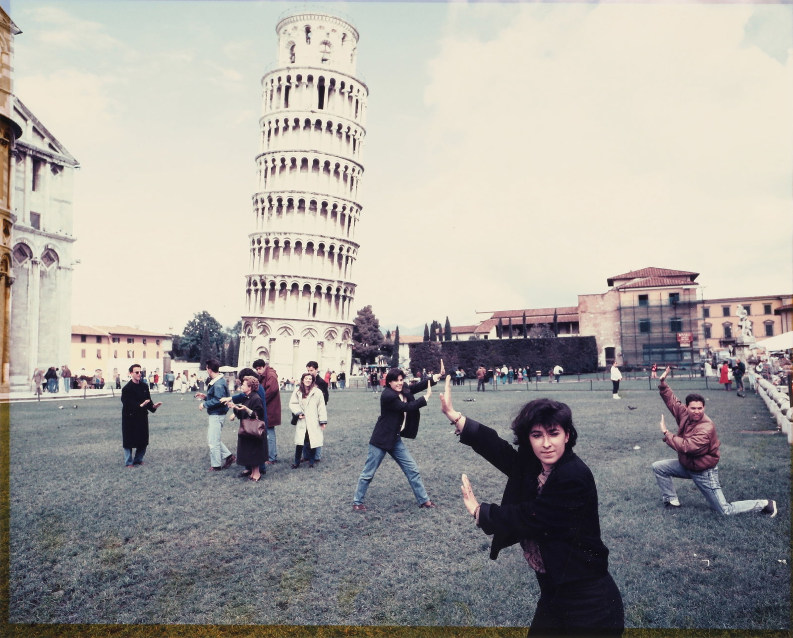 Martin Parr (1952-2025) The Leaning Tower of Pisa, 1990: Chromogenic print on Kodak paper, printed 1990s, image size 26.5 x 33cm, sheet size 30.5 x 37.5cm, with Parr's handwritten date/caption upper left corner verso [due to trimming, only a remnant of the 