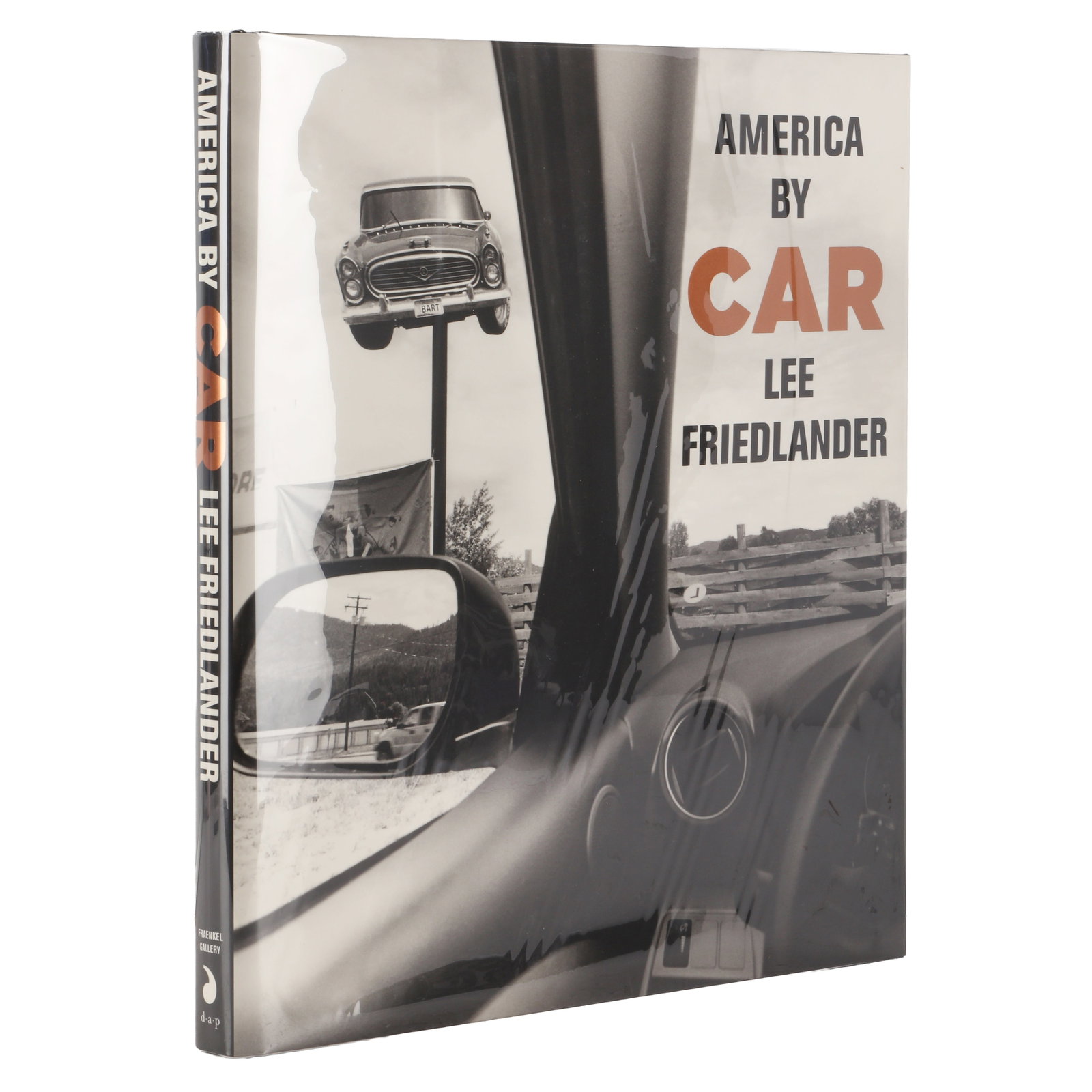 Lee Friedlander (b.1934) America By Car [Large Format Limited Edition, Signed]: Signed First Edition, hardback with pictorial dust jacket, black cloth boards, title stamped to upper cover and spine, signed by the photographer opposite title page, 200 pp., with 192 duotone plates.