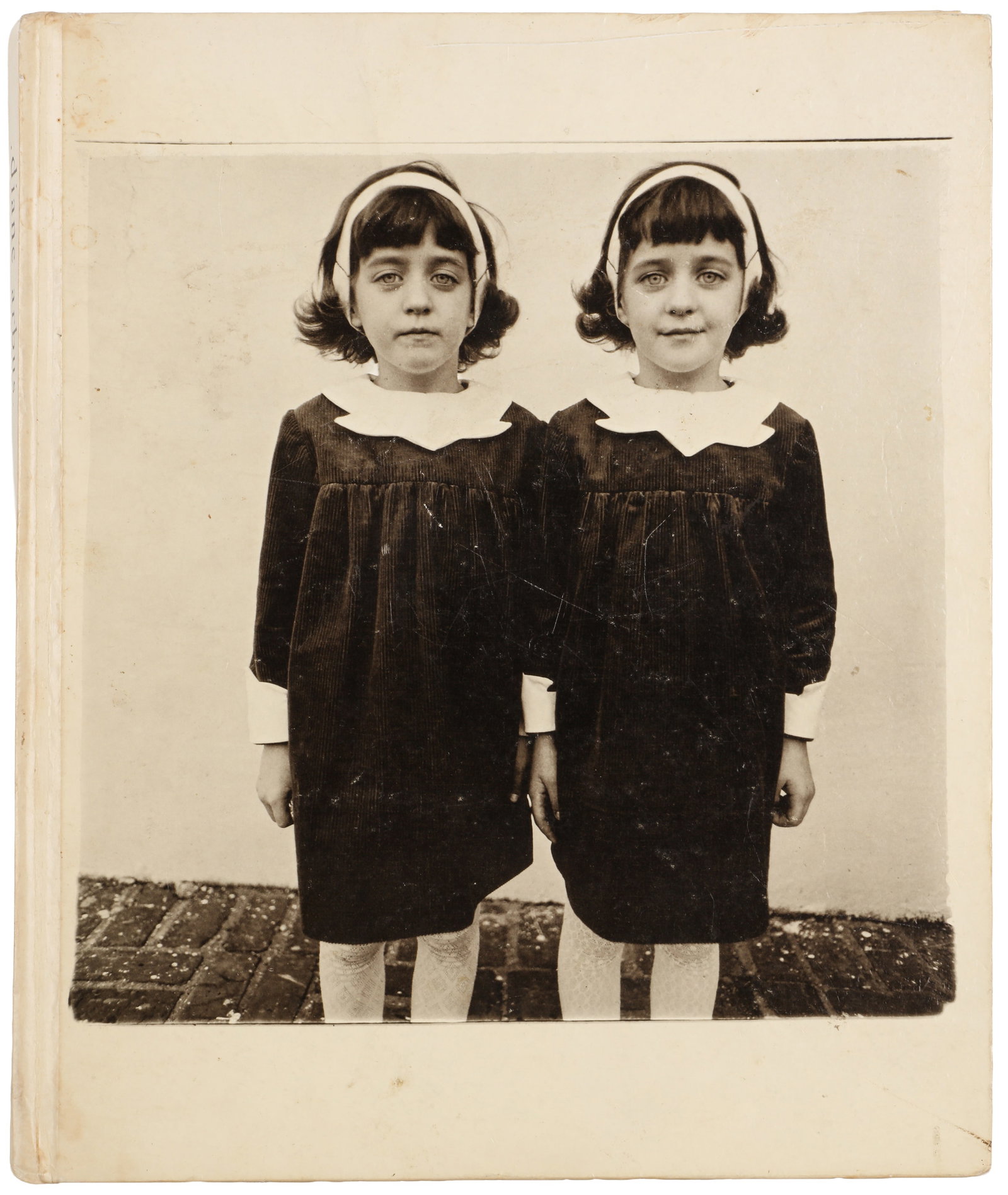 Diane Arbus (1923-1971) Monography, 1972: First edition, first printing, quarto, original white boards, photographic illustration to front board. A couple of annotations in blue ink on the introduction pages. New York: Aperture Foundation, 19