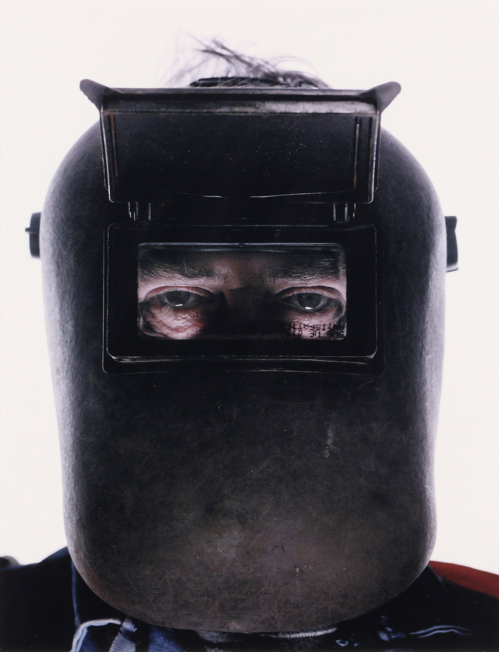 Brian Griffin (1948-2024) Ralph Hume, Welder [Teamphoto], 2005: C-print, image size 44.5 x 34cm, signed by the photographer in felt-tip pen verso. Framed, frame size 69 x 57cm. This image was part of the Griffin's project entitled Teamphoto: Portraits of the Peopl