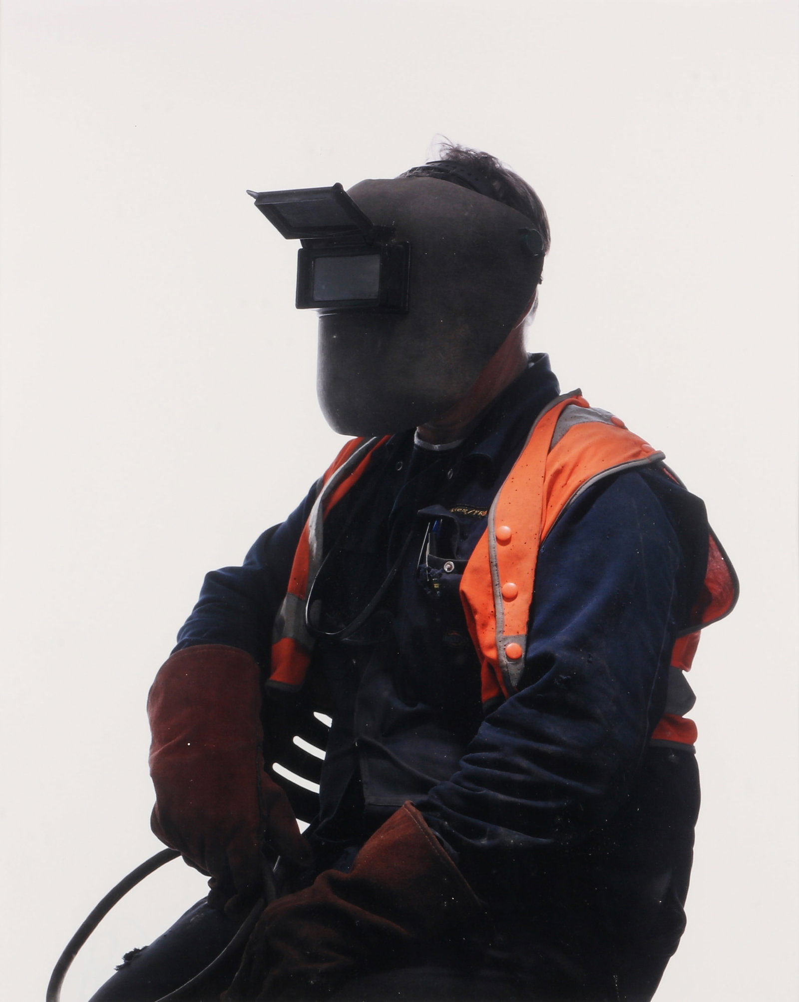 Brian Griffin (1948-2024) Portrait of a Welder [Teamphoto], 2007: C-print, image size 44.5 x 36cm, signed by the photographer in felt-tip pen verso. Framed, frame size 69.5 x 59.5cm. This image was part of the Griffin's project entitled Teamphoto: Portraits of the P