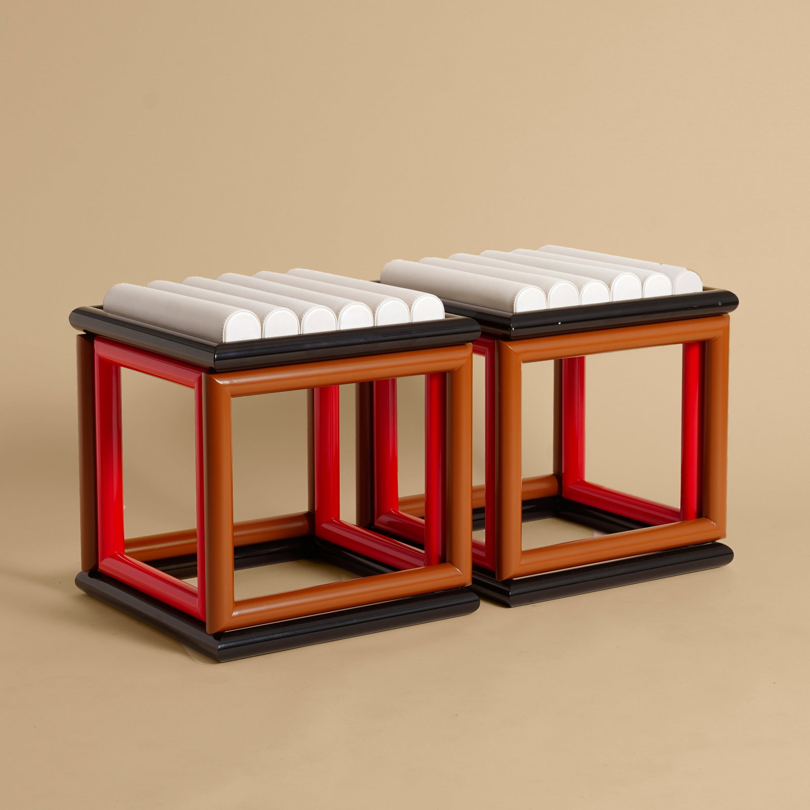 Jonathan Saunders (Scottish, b.1977) Pair of ?Renfrew? Stools: 2010s Leather, powder coated metal 46cm high x 45cm wide x 45cm deep Provenance: From a Distinguished Private International Collection