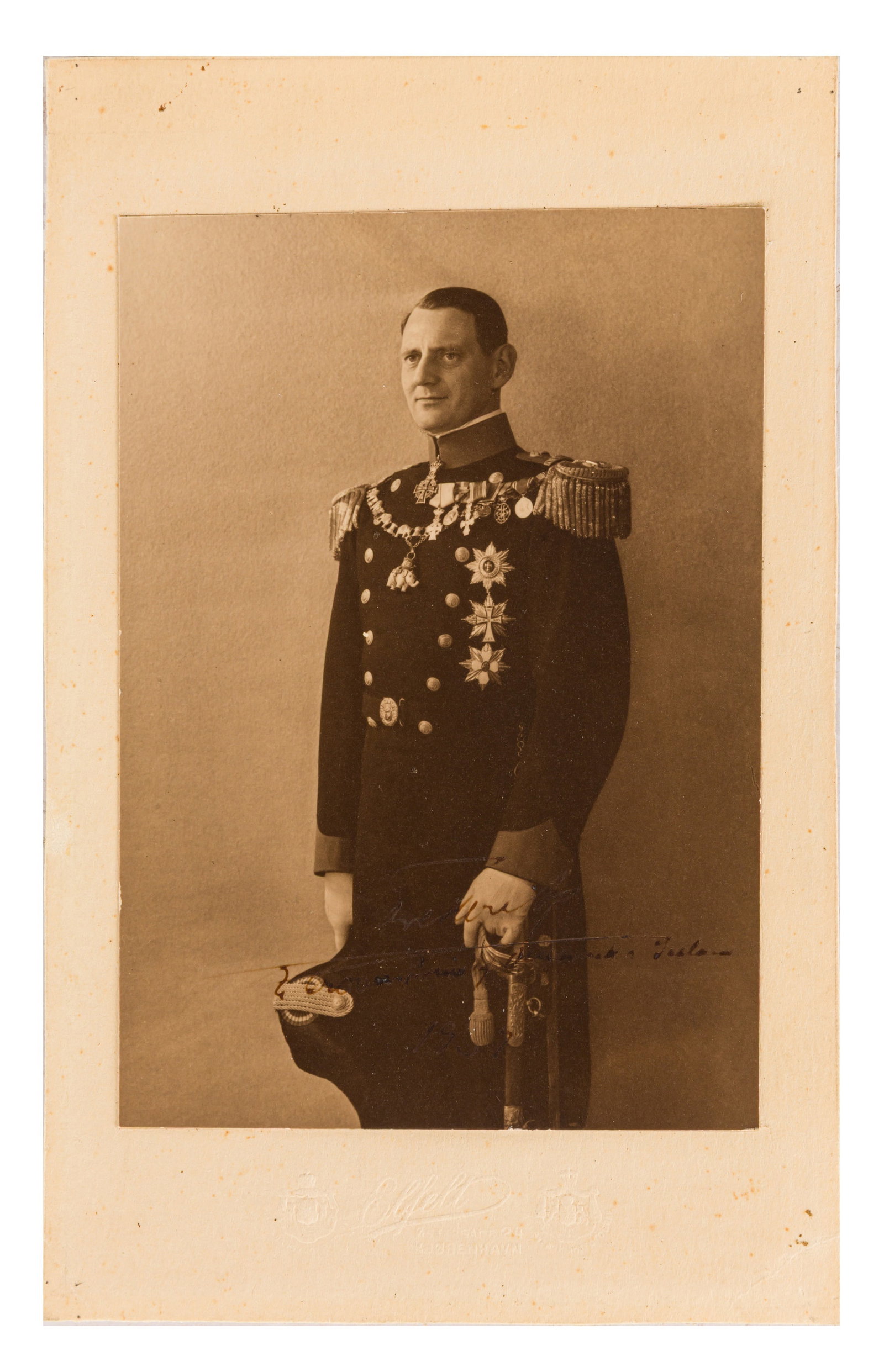Frederick IX, King of Denmark Signed photograph: Frederick IX, King of Denmark Signed photograph Three-quarter length photograph by Elflet of Copenhagen of Frederick IX as Crown Prince in naval dress uniform wearing the collar of the Order of the