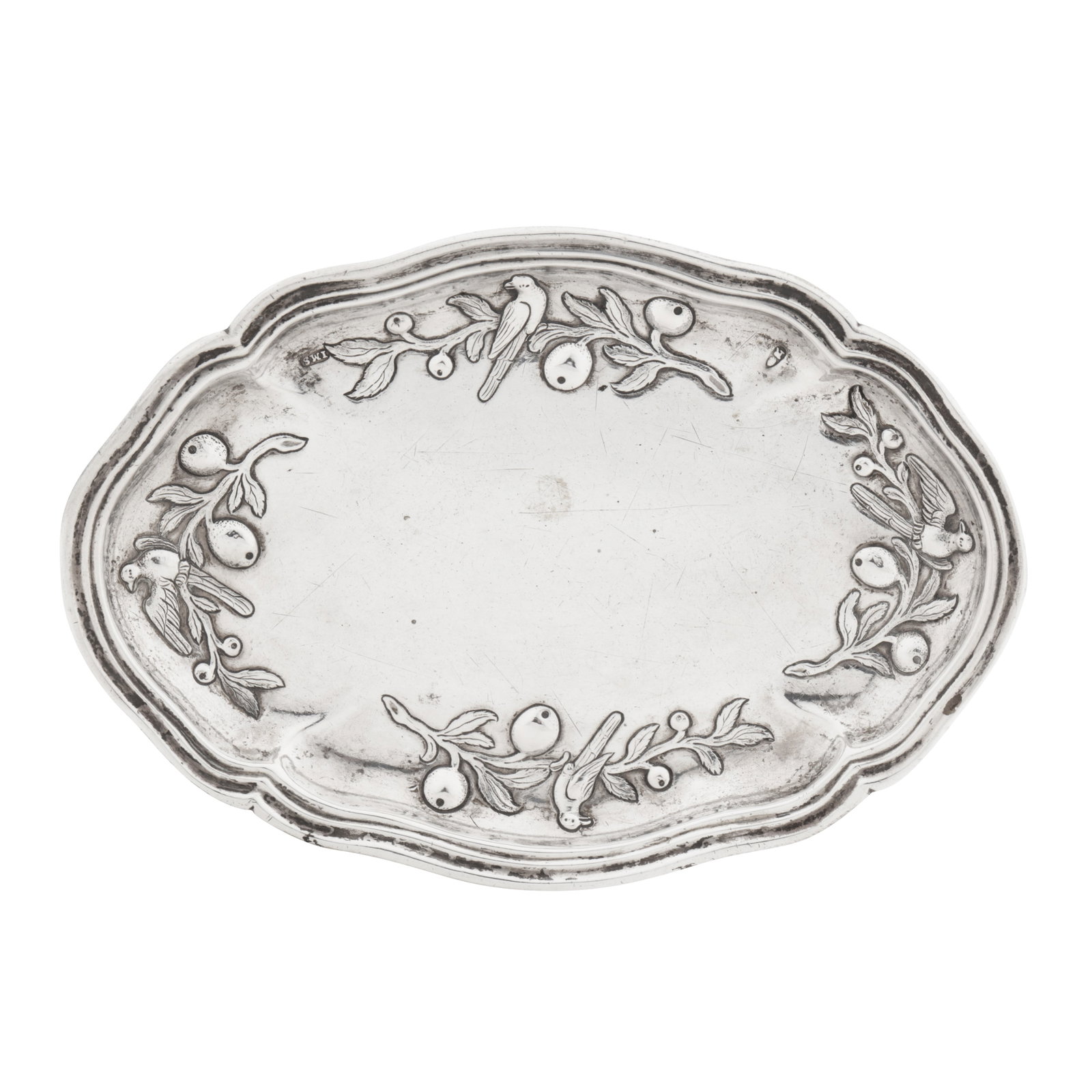 Augsburg 1765-67 by Johan Martin Satzger I (meister 1737, d. 1785) A mid-18th century German silver: Of shaped oval form with a moulded rim, the edge embossed with fruiting branches populated with birds. Marked to edge with makers mark IMS in an oval (Seling 2291), and date letter R. Length - 15.1 cm