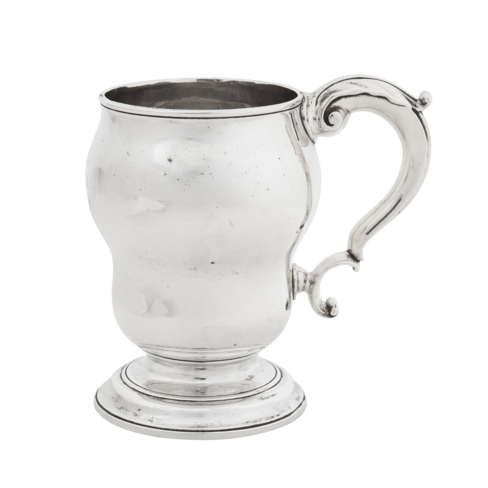 London 1764 by Frederick Knopfell (reg.11 April 1752) An unusual and rare early George III sterling: Of inverted double gourd baluster form with a moulded rim with a leaf capped double C scroll handle, all upon a spreading circular foot. Engraved to the front with contemporaneous initials TC in cursi