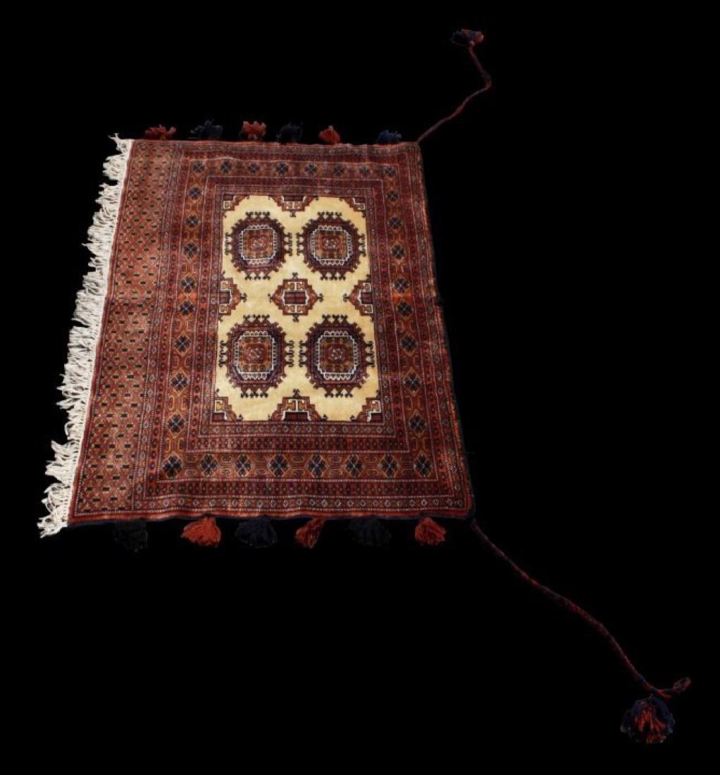 BOKHARA AFGHAN RUG: BOKHARA AFGHAN RUG. MEASURES 49" X 30"