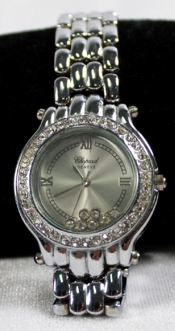 STAINLESS STEEL WATCH WITH CRYSTAL ACCENTS: STAINLESS STEEL WATCH WITH CRYSTAL ACCENTS, FAUX CHOPARD, NEEDS BATTERY