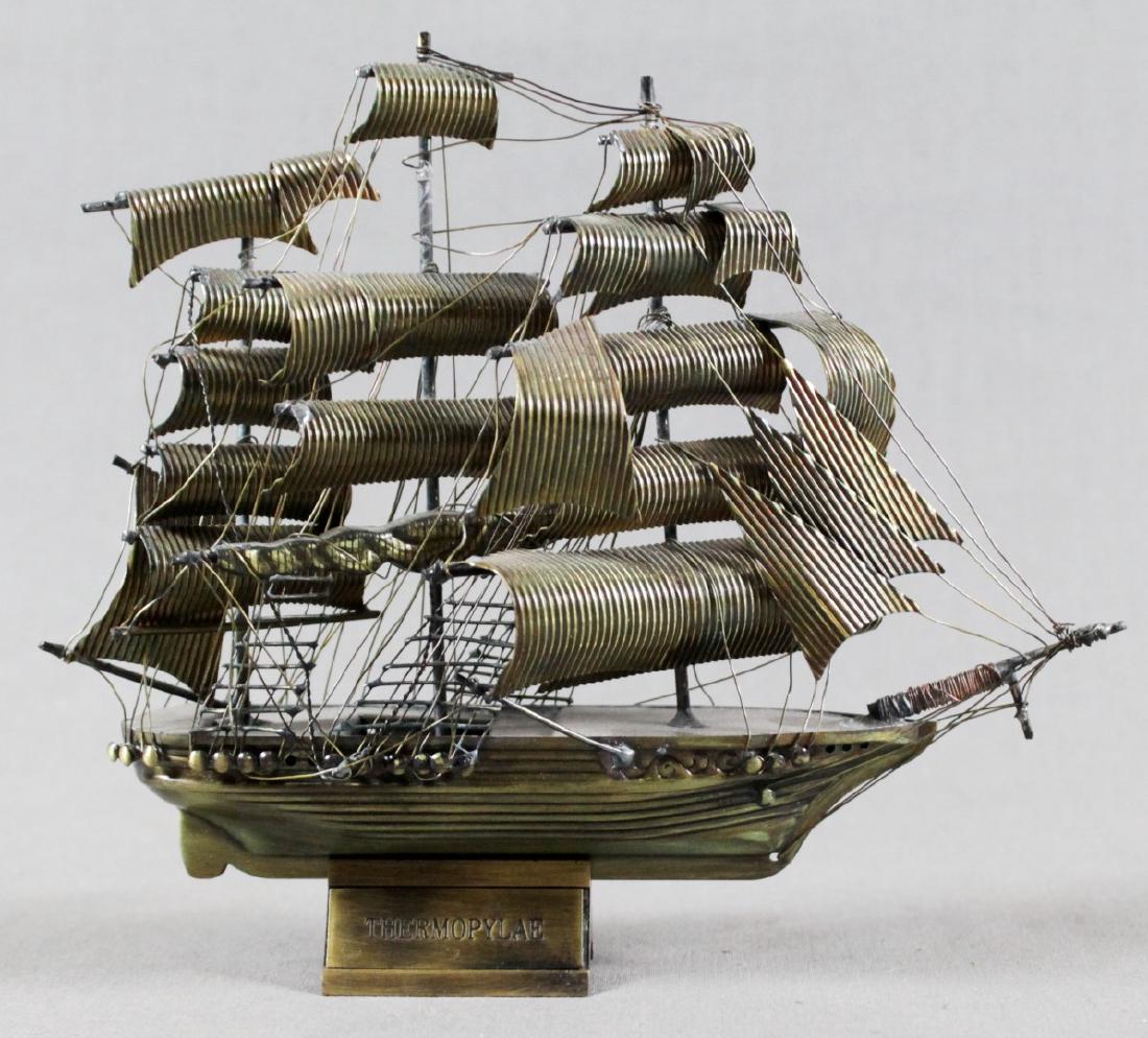 BRASS MINIATURE MODEL OF BOAT ON STAND (1 of 3)