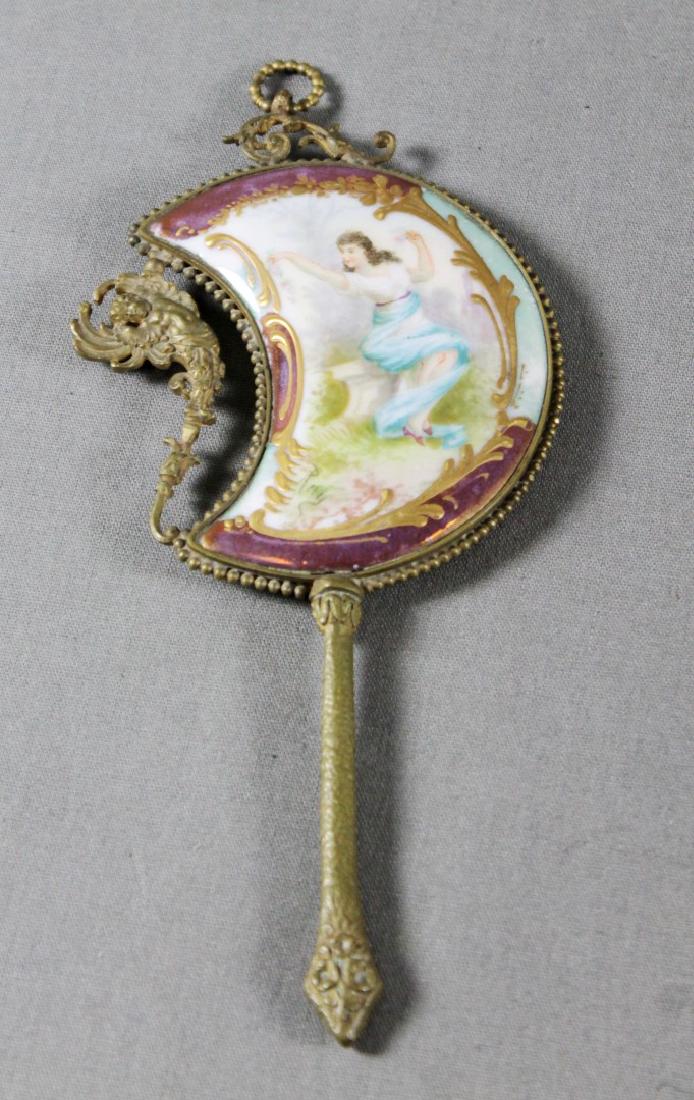 ENAMEL HAND MIRROR: ENAMEL HAND MIRROR, MEASURES 6 1/2" X 3"