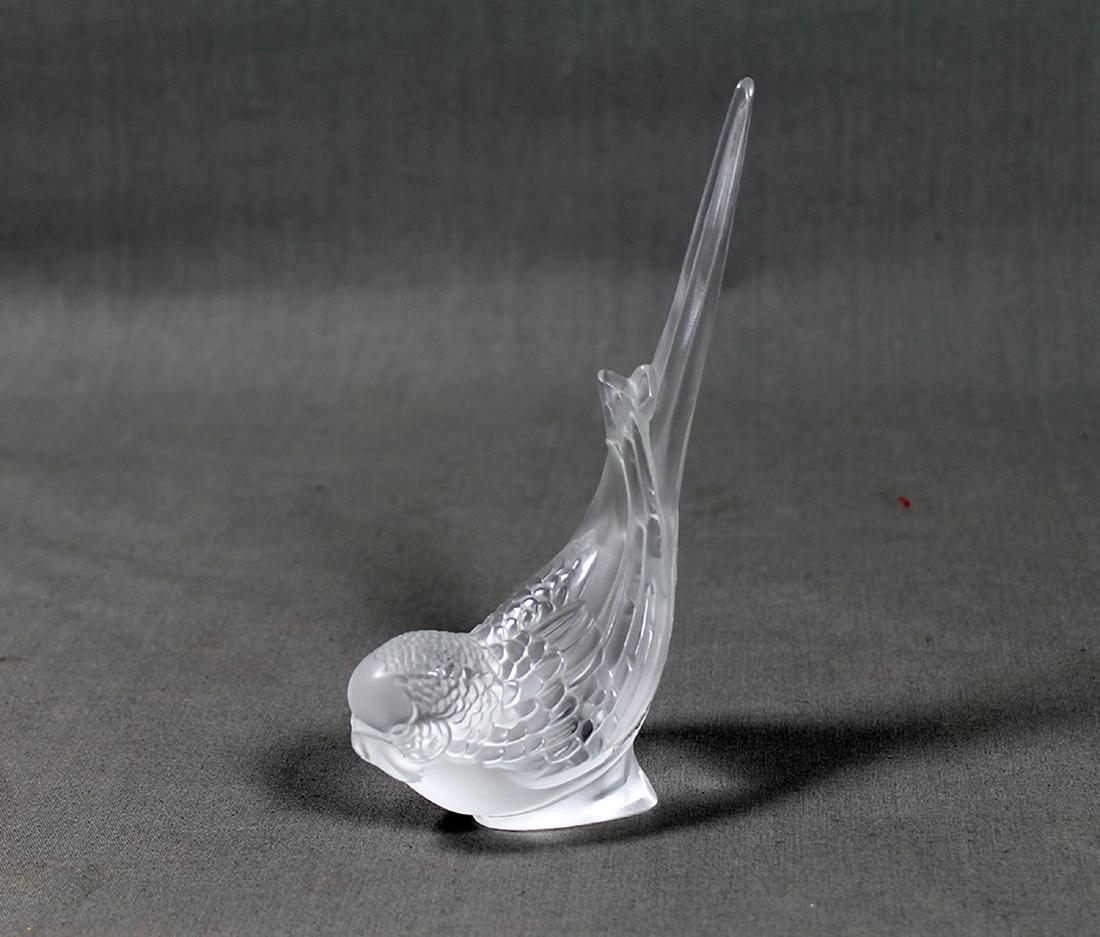 LALIQUE BIRD: Lalique glass and jewelry were made by Rene Lalique (1860-1945) in Paris, France, between the 1890s and his death in 1945. Beginning in 1921 he had a manufacturing plant in Alsace. The glass was molde