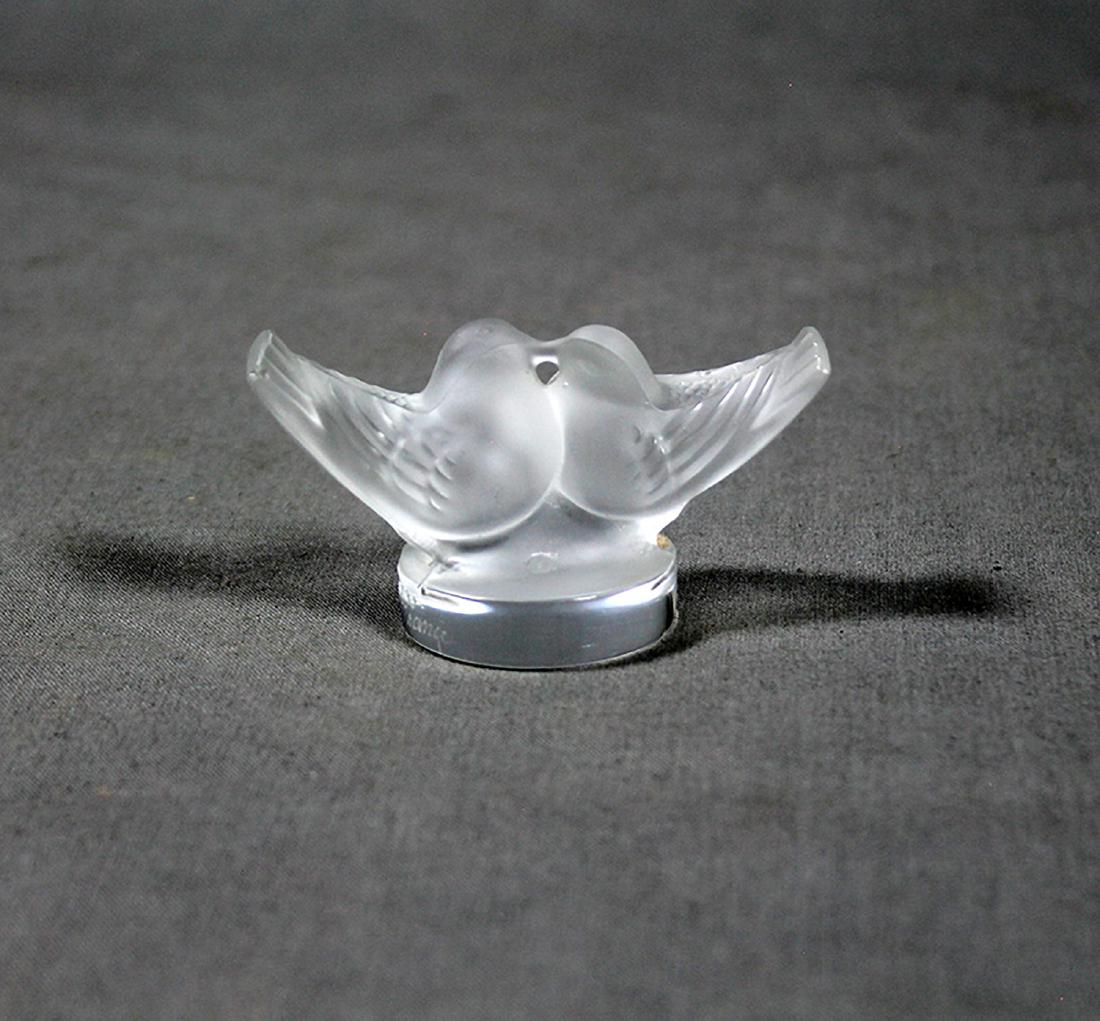 LALIQUE BIRD: Lalique glass and jewelry were made by Rene Lalique (1860-1945) in Paris, France, between the 1890s and his death in 1945. Beginning in 1921 he had a manufacturing plant in Alsace. The glass was molde