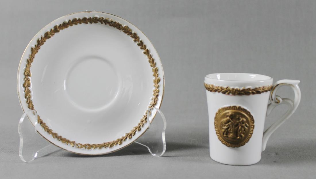 ROYAL VIENNA CUP AND SAUCER: ROYAL VIENNA CUP AND SAUCER . THE CUP MEASURES H: 2 1/2" AND THE SAUCER MEASURES 4 1/2" DIAMETER