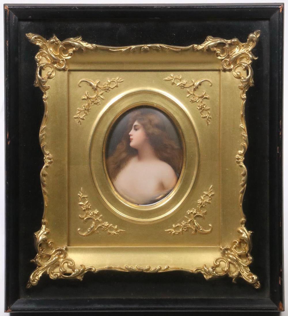 GERMAN PORCELAIN PLAQUE IN SHADOWBOX FRAME: KPM School partially nude portrait plaque of the Classical Greek nymph, Erbluht, after the original by Angelo Asti (1847-1903), housed in a foliate decorated giltwood frame, within a shadowbox, circa