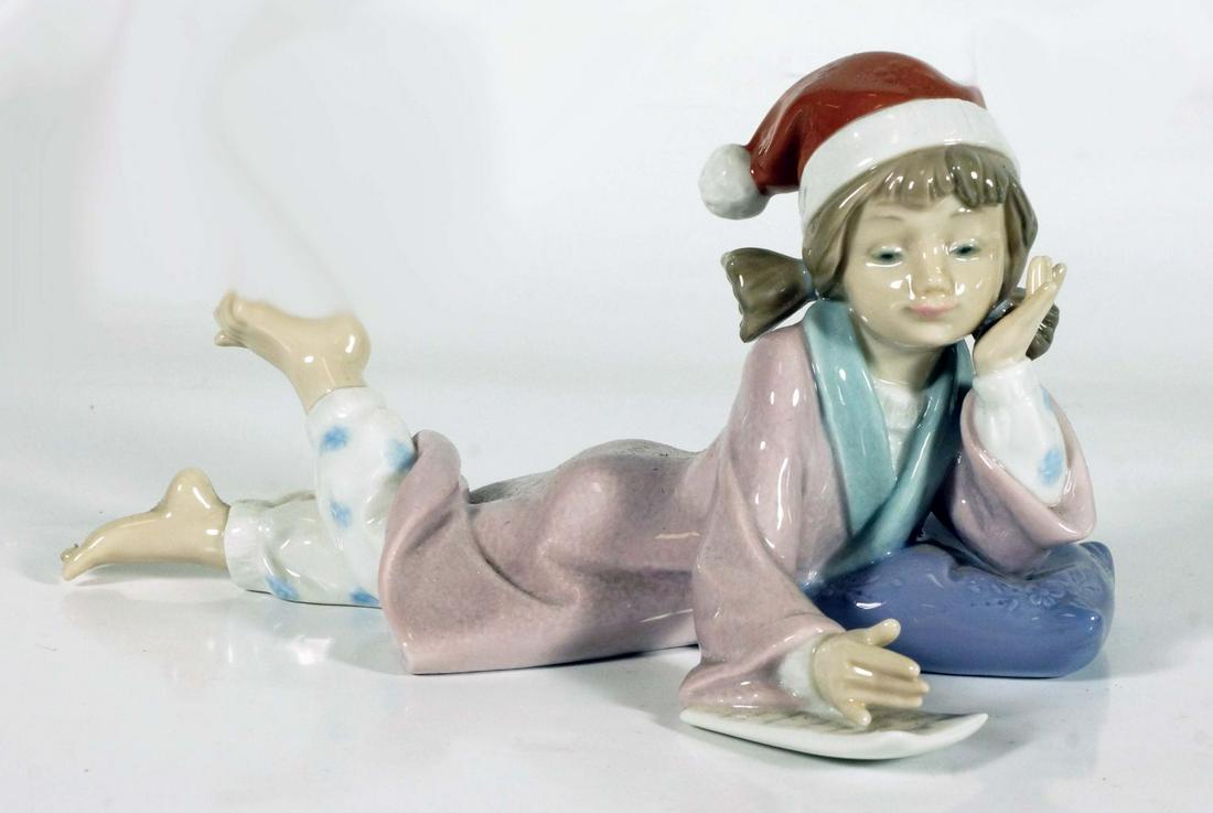 Lladro Christmas Wishes #6194: 4" H 7" W 2" D The Lladro (LladrÃƒÂ³) story began in 1953 when three brothers used their bare hands to create the beginning of a now large scale Spanish porcelain company. Brothers; Juan, Jose, an