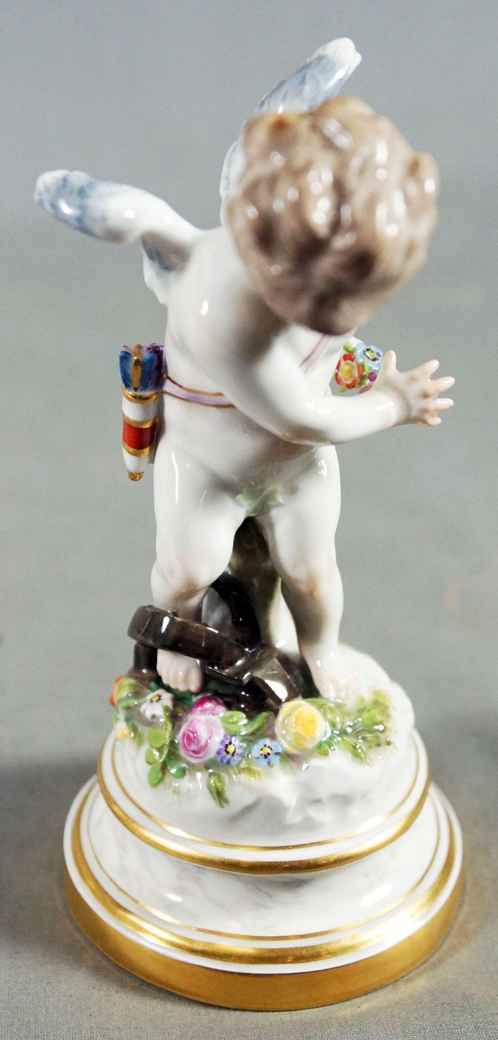 Meissen Figure Of Cherub Caught In Trap: 3.5" Base 8" H Meissen porcelain or Meissen china was the first European hard-paste porcelain. Early experiments were done in 1708 by Ehrenfried Walther von Tschirnhaus. After his death that October,