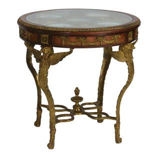 Empire Style Ormolu and Porcelain Mounted Gueridon: Empire Style Ormolu and Porcelain Mounted Gueridon. The round top with glass display, showing five inset porcelain portrait plates; the top supported by a ormolu base with an eagle motif.