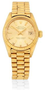 Rolex a lady's 18K Gold Automatic Calendar Bracelet: Rolex. A lady's 18K Gold Automatic Calendar Bracelet Rolex. A lady's 18K gold automatic calendar bracelet watch Model: Datejust Reference: 6917 Date: Circa 1982 Movement: 28-jewel Cal.2030 automatic,