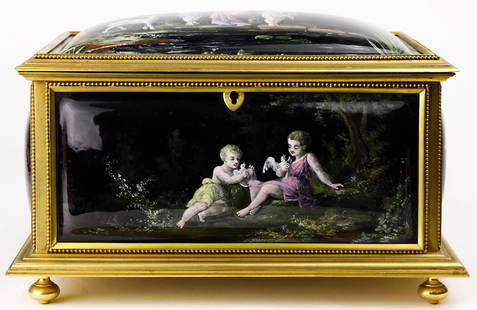 A French Gilt Bronze And Enameled Porcelain Jewelry Box: 9" L, 6.5" WA French gilt bronze and enameled porcelain jewelry box, signed "L. Coblentz," for Levy Coblentz, having a hinged top opening to a lined interior, the scenic panels decorated with