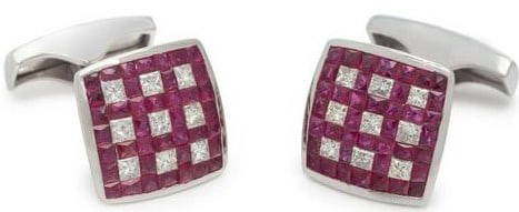 14K White Gold Ruby and Diamond Cufflinks: 14K White Gold Ruby and Diamond Cufflinks Containing numerous French-cut rubies and 18 princess-cut diamonds weighing approximately 0.85 carats in total Mounted in white gold Measure approximately 1/2