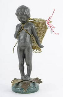 Petites Choses Figurine Cherub with Basket Votive Statue Marble Base: 7" Petites Choses Figurine Cherub with Basket Votive Statue Marble Base Metal Statue Cherub with basket Woven wire basket with a frosted glass votive Marble base The lovely weighty figurine feels like