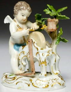 A Meissen Figure of Cupid Sharpening his Arrows 19th Century: A Meissen Figure of Cupid Sharpening his Arrows 19th CenturyWearing a loose blue drape, modeled at a wheel on a rococo stand before a tree stump, on a shaped oval scroll-molded baseThe charming